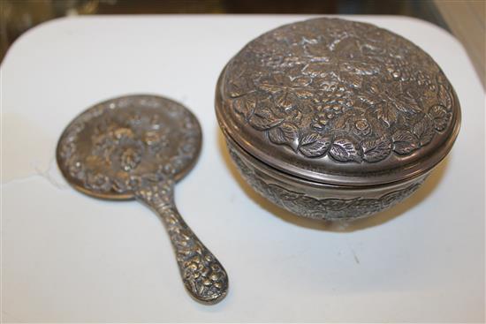 Chinese silver hand mirror, cast floral decoration, stamped 90 & a vineous embossed silver [800] circular box & cover(-)